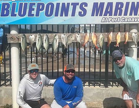  Posing in front of the Bluepoints marina sign